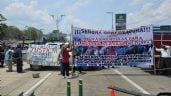 Foto ilustrativa de la nota titulada: Van nueve horas de bloqueo en la Autopista del Sol; ejidatarios exigen solución a conflicto agrario
