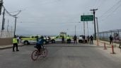 Foto ilustrativa de la nota titulada: Frenan militares y antimotines a ciclistas que rechazan ampliación de puerto en Ensenada