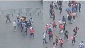 Foto ilustrativa de la nota titulada: Comerciantes ambulantes arman campal en Zócalo de la CDMX por espacios para vender (Videos)