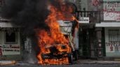 Foto ilustrativa de la nota titulada: Ayotzinapa: Derriban puerta del Campo Militar 1 en CDMX e incendian camión (Video y fotogalería)