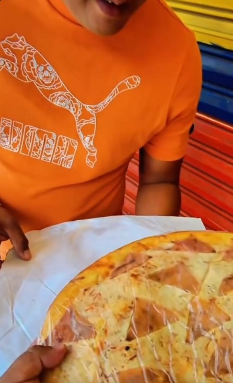 Estafa de pizzas piratas exponen falso repartidor de Dominos VIDEO